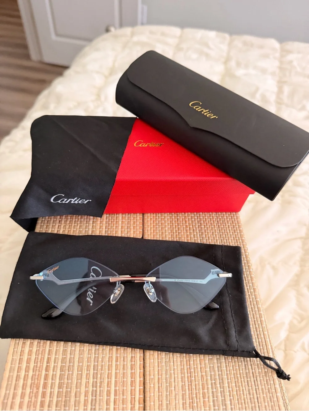 Cartier Rimless Sunglasses with Blue Lenses and Gold Accents